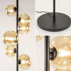 Art Deco vloerlamp zwart met amber glazen bollen