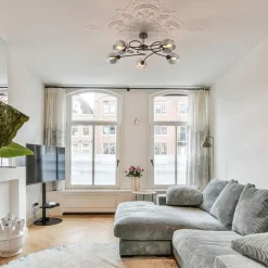 Chique 5-lichts plafondlamp zwart met smoke glazen bollen