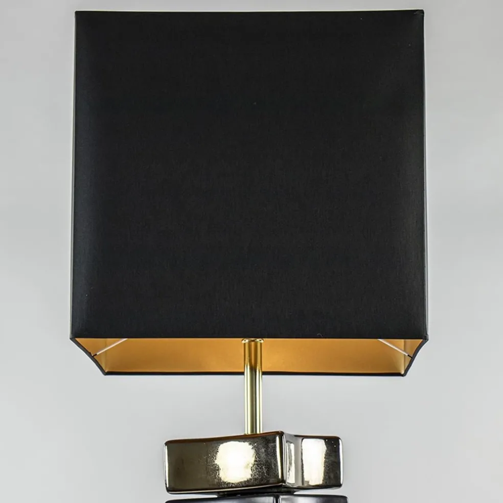 Design vloerlamp keramiek zwart/goud met zwarte kap