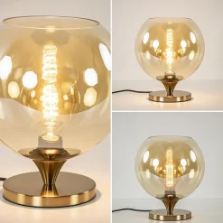 Elegante tafellamp donker goud met amber glazen bol 25 cm