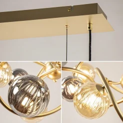 Grote hanglamp goud met amber/smoke glazen bollen