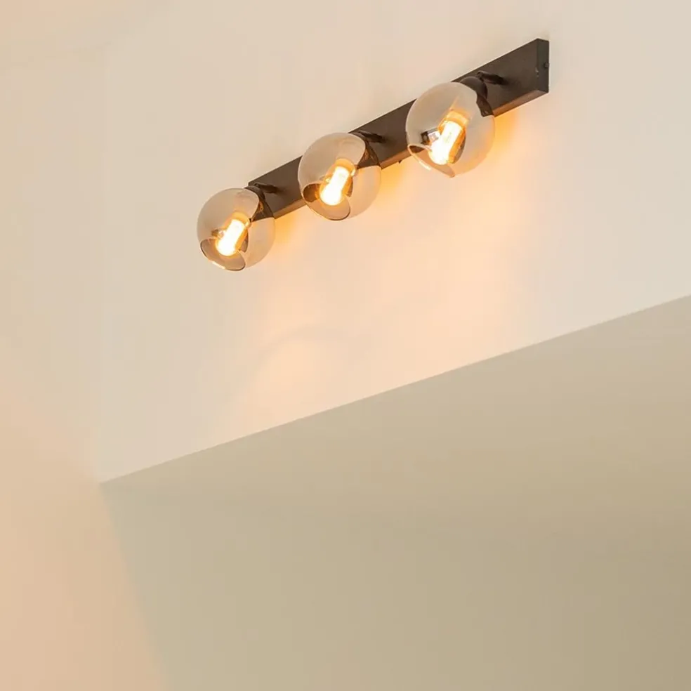 Langwerpige plafondlamp mat zwart met smoke glazen bollen
