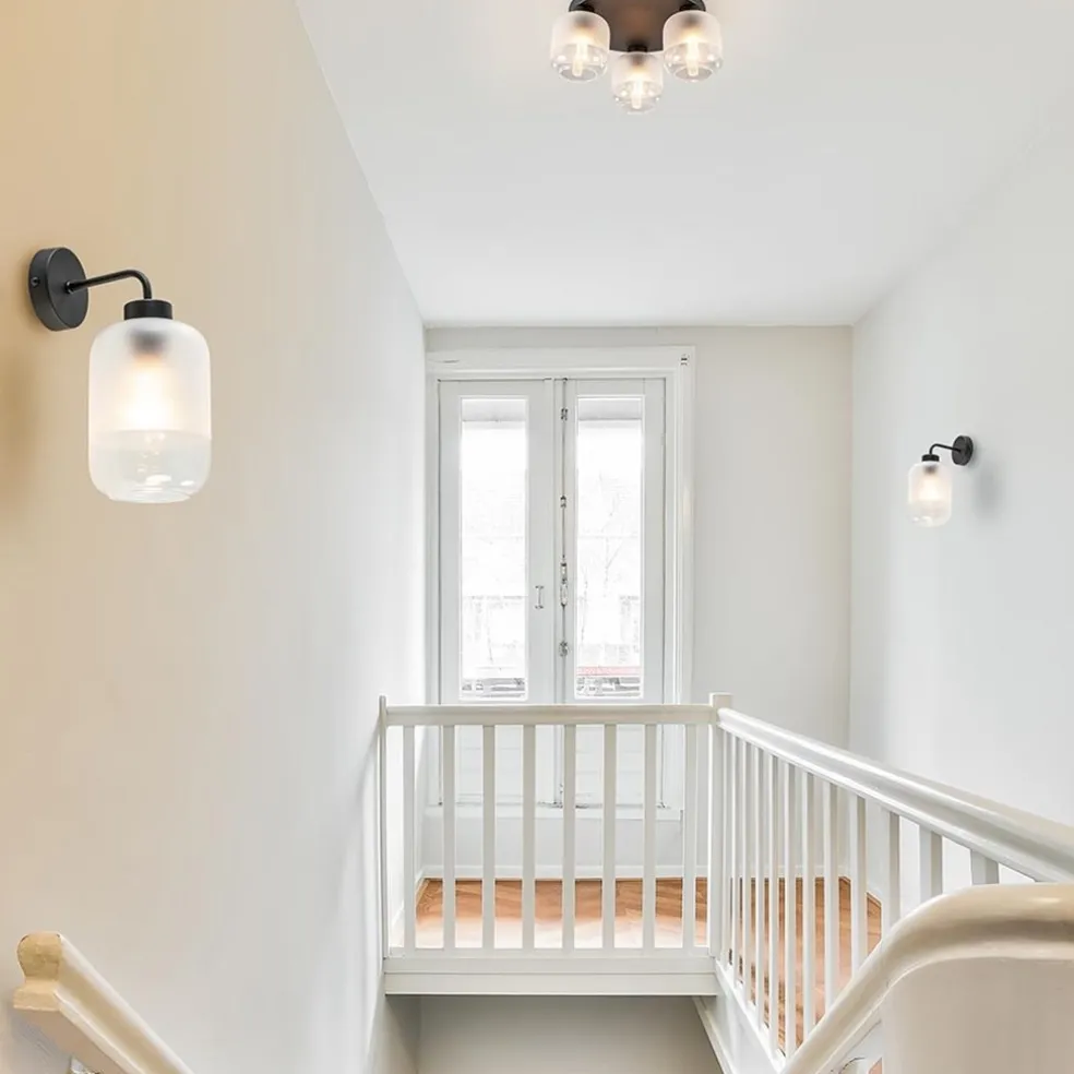 Moderne wandlamp zwart met helder/mat glas