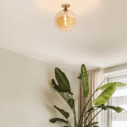 Plafondlamp goud met amber glazen bol 30 cm