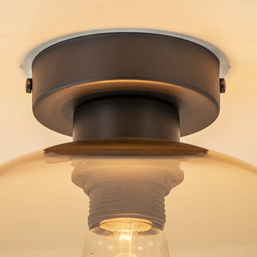 Retro plafondlamp zwart met amber glazen bol
