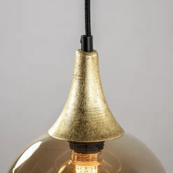 Ronde 3-lichts hanglamp zwart met goud en amber glas