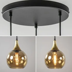 Ronde 3-lichts hanglamp zwart met goud en amber glas