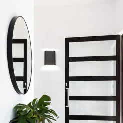 Wandlamp zwart/goud ovaal dimbaar